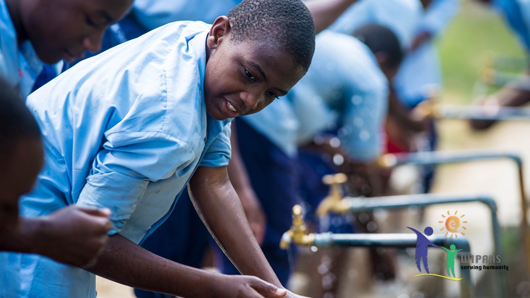 WIPAHS-African boys enjoying tap water